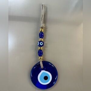 Evil eye or Blue eye bead negative energy caused by envy.